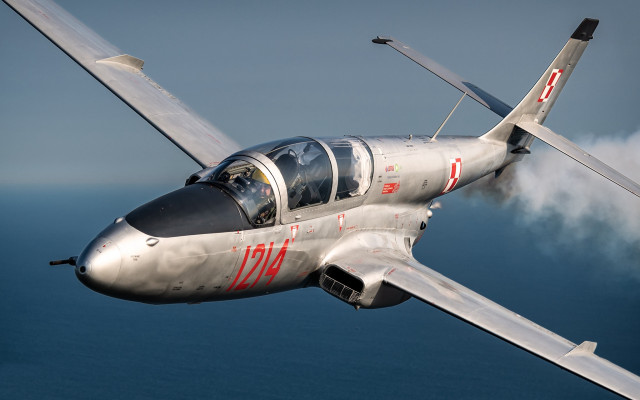 Silver airplane ocean smoke red free wallpaper - medium preview image