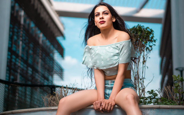 Woman cityscape metal sitting denim free wallpaper - medium preview image