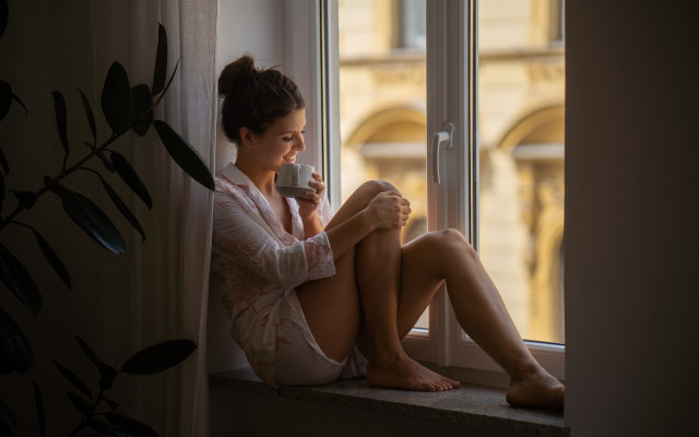 Woman sitting coffee window city free wallpaper - medium preview image
