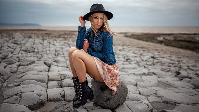 Woman hat boots rocks field free wallpaper - medium preview image