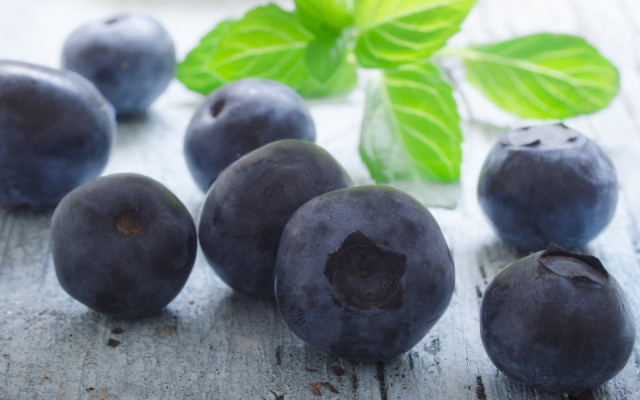 Blueberries wooden table green leaves free wallpaper - medium preview image