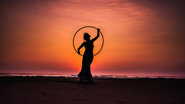 Woman hoop beach sunset cinematic free wallpaper - medium preview image