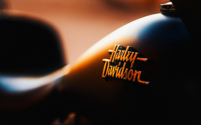 Motorcycle logo closeup shallow depth free wallpaper - medium preview image