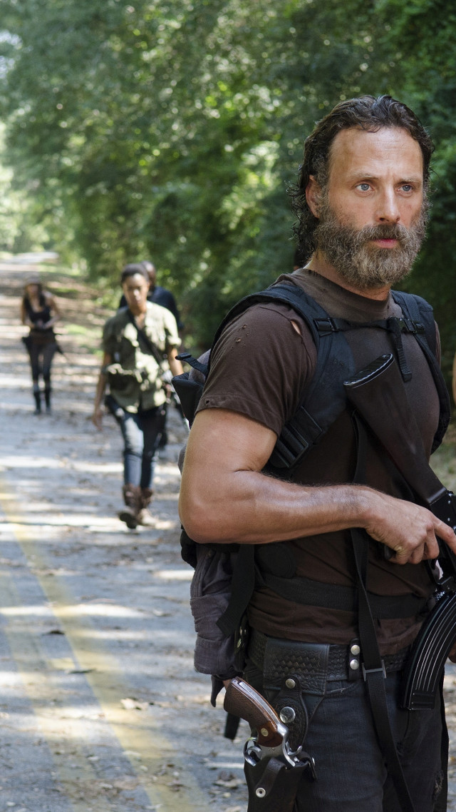 Bearded man gun walking road free wallpaper - medium preview image