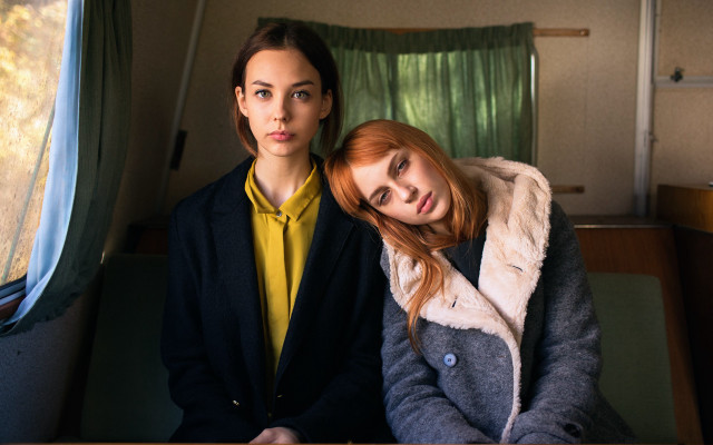 Train scene two women fur free wallpaper - medium preview image