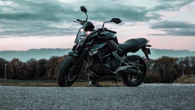 Motorcycle road field trees cloudy free wallpaper - medium preview image