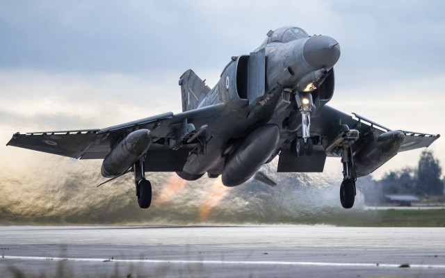 Fighter jet takeoff smoke puzzle free wallpaper - medium preview image