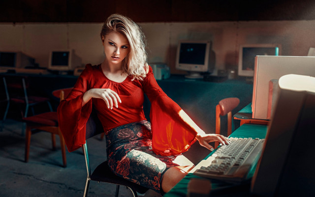 Woman red shirt computer desk free wallpaper - medium preview image