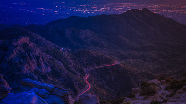 Mountain road night city lights free wallpaper - medium preview image