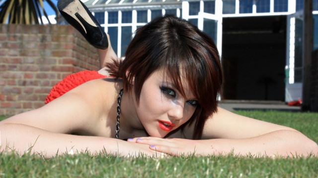 Woman grass shoe house portrait free wallpaper - medium preview image