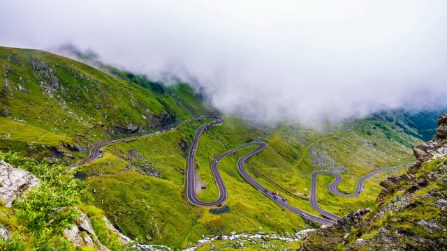 Winding road mountains cloudy sky free wallpaper - medium preview image