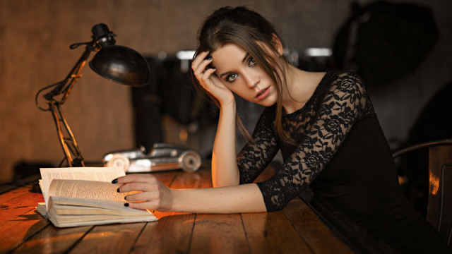 Woman sitting reading book lamp #2 free wallpaper - medium preview image