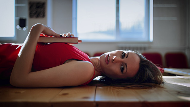 Woman laying on floor with free wallpaper - medium preview image