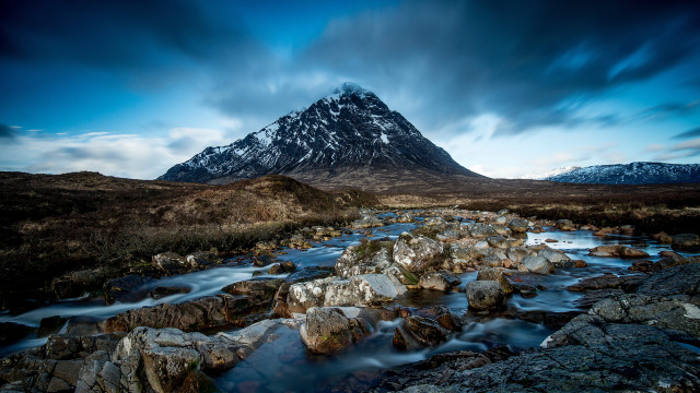 Mountain stream rocks cloudy sky free wallpaper - medium preview image