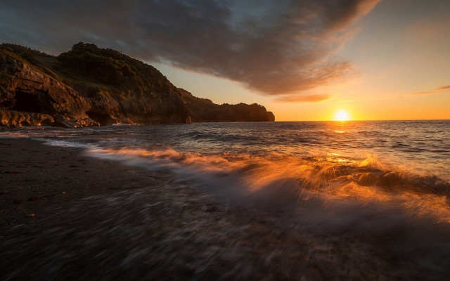 Sunset beach waves rock island free wallpaper - medium preview image