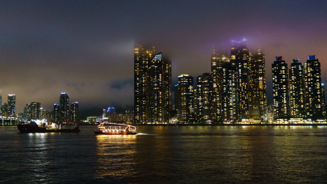 Boat city night lights reflection free wallpaper - medium preview image