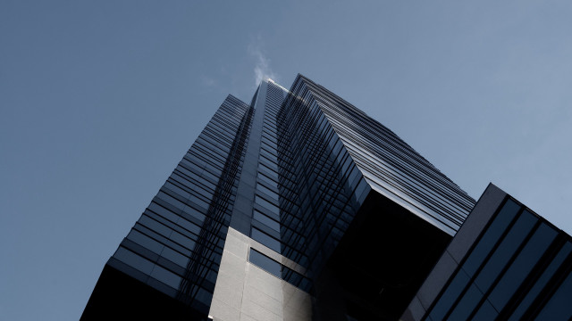 Tall building sky clouds tiltshift free wallpaper - medium preview image
