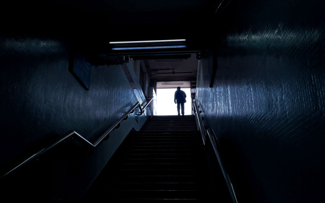 Dark hallway man stairs light free wallpaper - medium preview image
