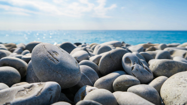 Rocky shore ocean cloudy sky free wallpaper - medium preview image