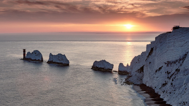 Sunset cliff lighthouse ocean waves free wallpaper - medium preview image