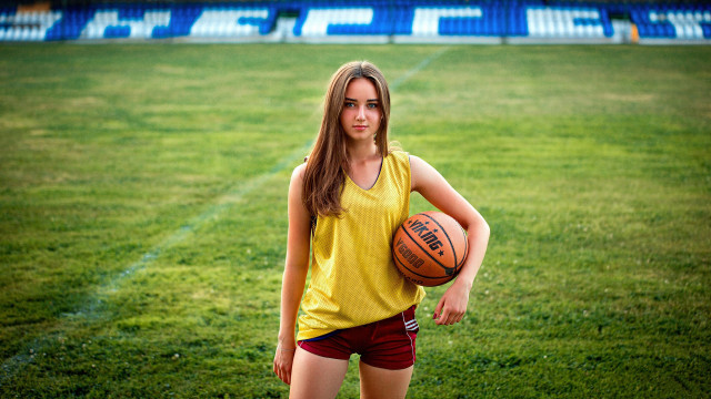 Girl yellow shirt basketball field free wallpaper - medium preview image