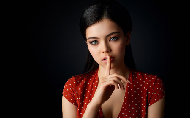 Woman red polka dot shushing free wallpaper - medium preview image