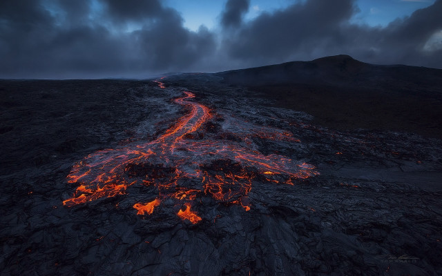 Lava trail night sky mountainous free wallpaper - medium preview image