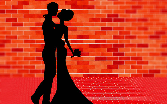 Couple kissing silhouette brick wall free wallpaper - medium preview image