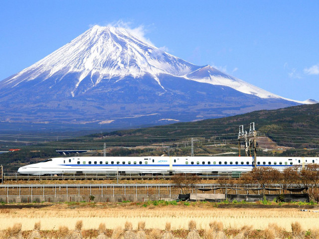 Train mountain snowfield bridge cityscape free wallpaper - medium preview image