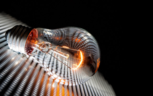 Glowing lightbulb black background lines free wallpaper - medium preview image