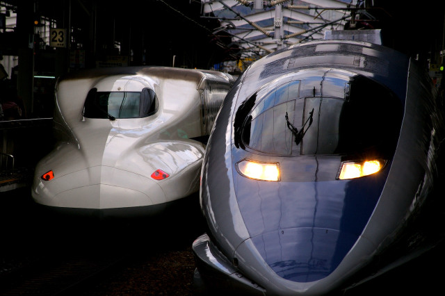 Two trains parked side by free wallpaper - medium preview image