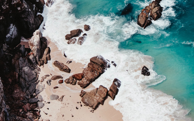 Beach rock formation water shore free wallpaper - medium preview image