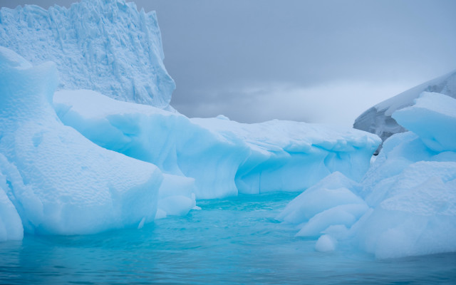 Glacier stream iceberg cloudy sky free wallpaper - medium preview image