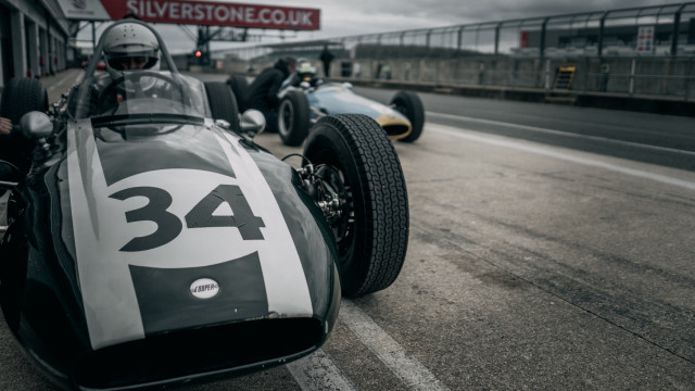 Vintage racecar helmeted man cobra free wallpaper - medium preview image