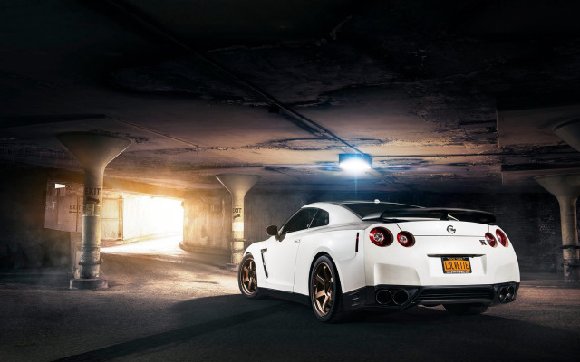 White sports car parking garage #5 free wallpaper - medium preview image