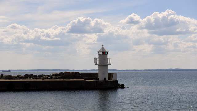 Lighthouse pier ocean boat cloudy free wallpaper - medium preview image