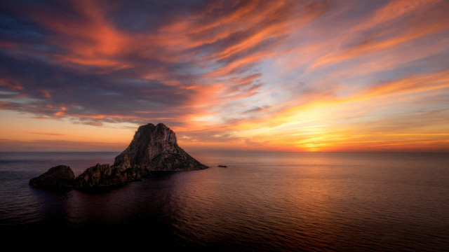 Rock formation ocean sunset colorful free wallpaper - medium preview image