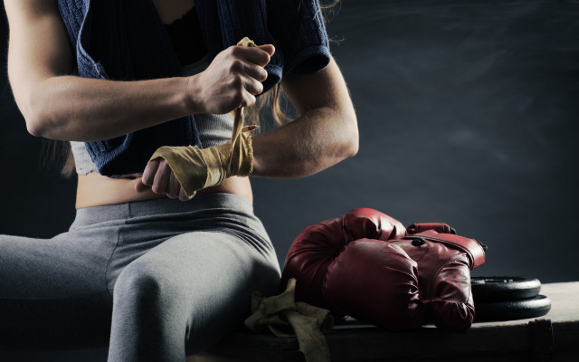 Woman boxing gloves table boots free wallpaper - medium preview image