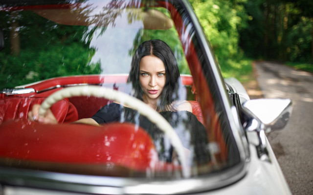 Woman red car window steering free wallpaper - medium preview image