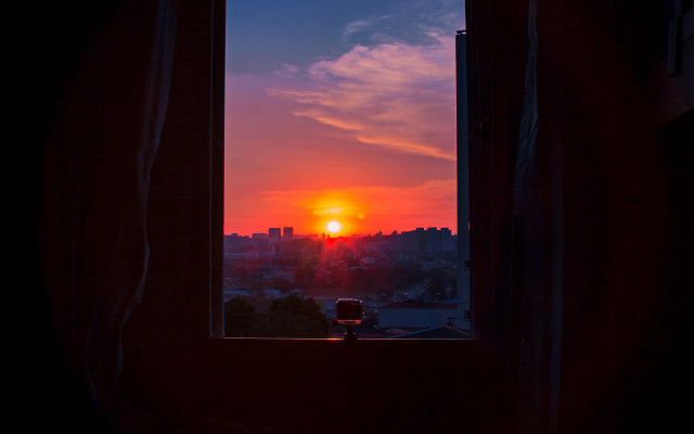 Sunset cityscape mountain reflection orange free wallpaper - medium preview image