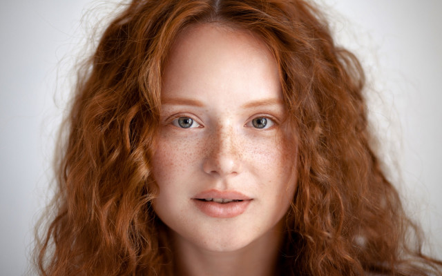 Freckled woman smile realistic portrait free wallpaper - medium preview image