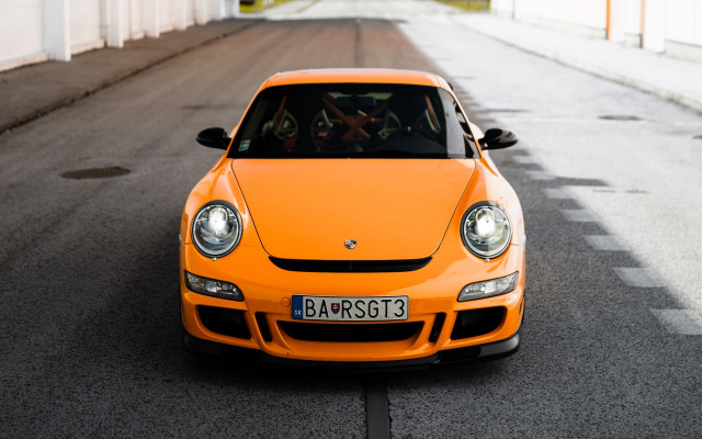 Yellow car street white building free wallpaper - medium preview image