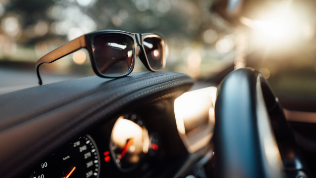 Sunglasses dashboard speedometer maximalism bokeh free wallpaper - medium preview image