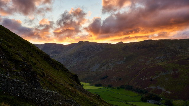 Mountain grassyfield sunset clouds cityscape free wallpaper - medium preview image