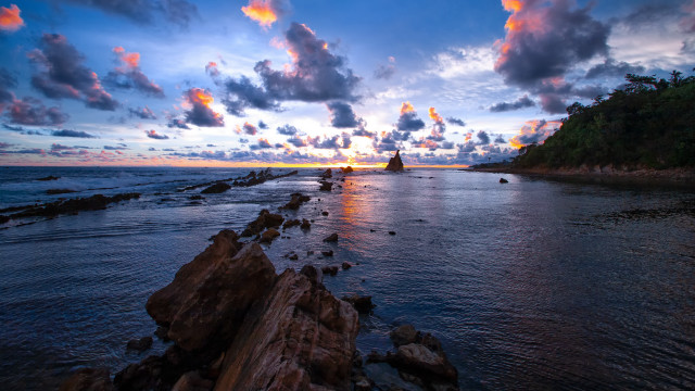 Sunset rocky beach island matte free wallpaper - medium preview image