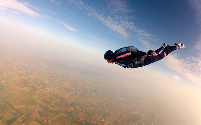 Parachute flying over crops sunset free wallpaper - medium preview image