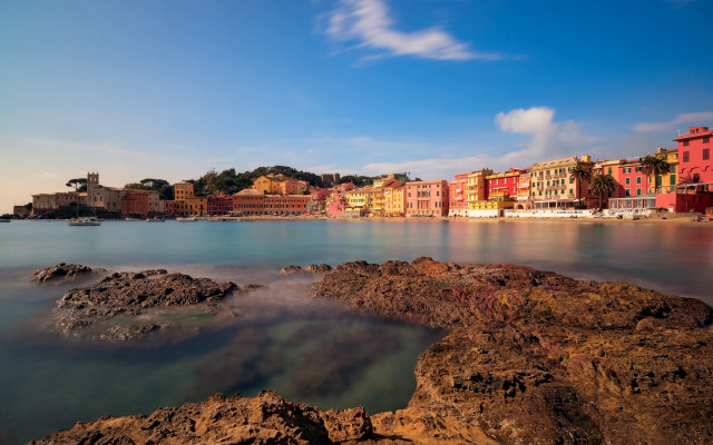 Beach buildings water rocks sunset free wallpaper - medium preview image
