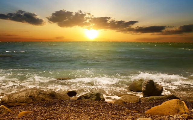 Sunset ocean rocks shore clouds free wallpaper - medium preview image
