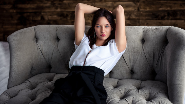 Woman sitting couch arms behind #2 free wallpaper - medium preview image