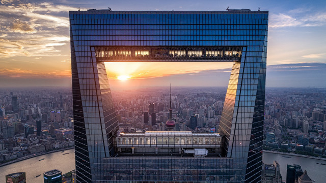 Tall building large window sunset free wallpaper - medium preview image